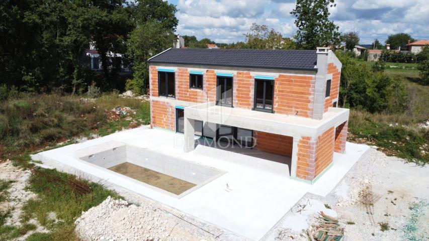 Poreč, surroundings, modern villa with swimming pool in nature