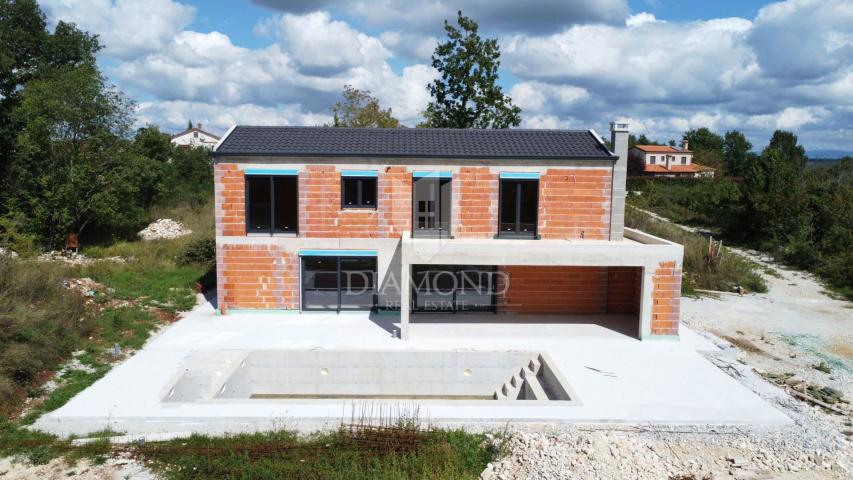 Poreč, surroundings, modern villa with swimming pool in nature