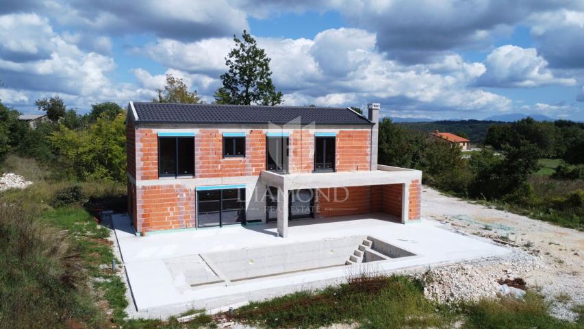 Poreč, surroundings, modern villa with swimming pool in nature
