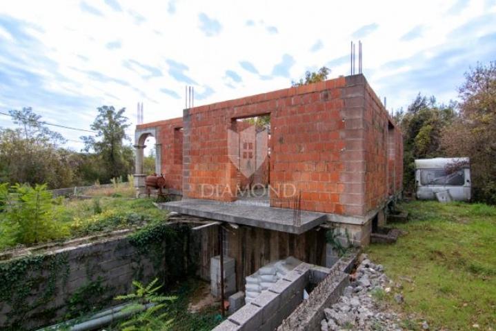 KRK, HOUSE UNDER CONSTRUCTION