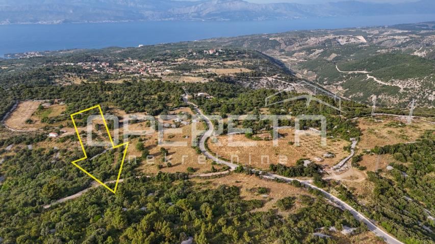 Prostrano poljoprivredno zemljište, 14.027 m2 s pogledom i uz pristupni put, Škr