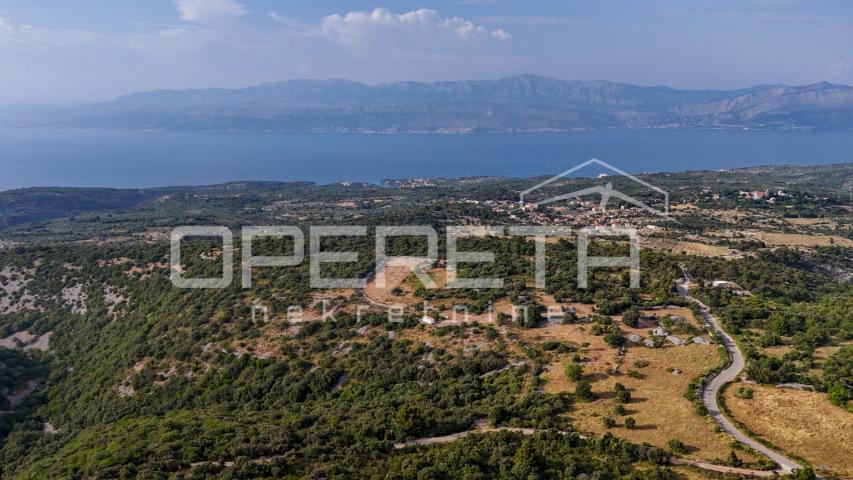 Prostrano poljoprivredno zemljište, 14.027 m2 s pogledom i uz pristupni put, Škr