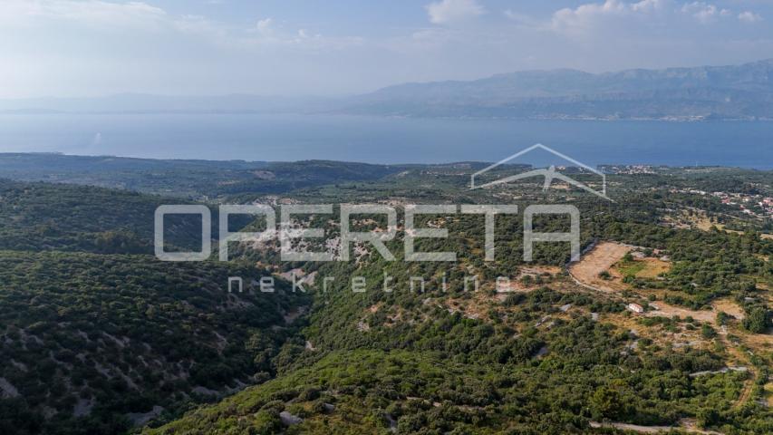 Prostrano poljoprivredno zemljište, 14.027 m2 s pogledom i uz pristupni put, Škr