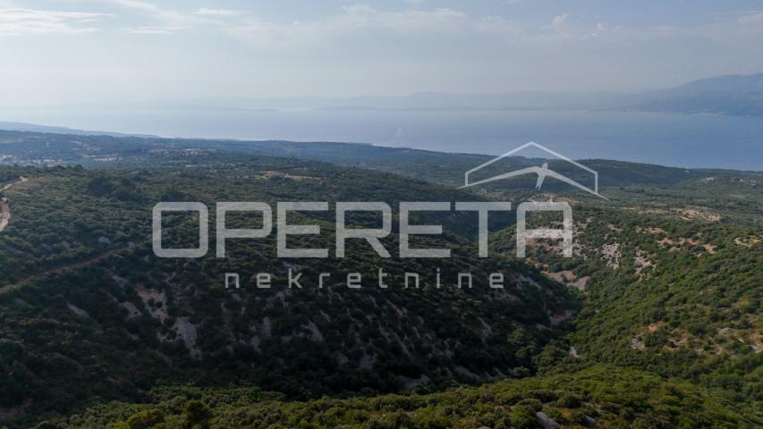 Prostrano poljoprivredno zemljište, 14.027 m2 s pogledom i uz pristupni put, Škr