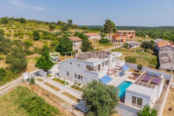Istra, Poreč, unikatna dizajnerska vila s dodatnim apartmanom, wellnessom i grijanim bazenom