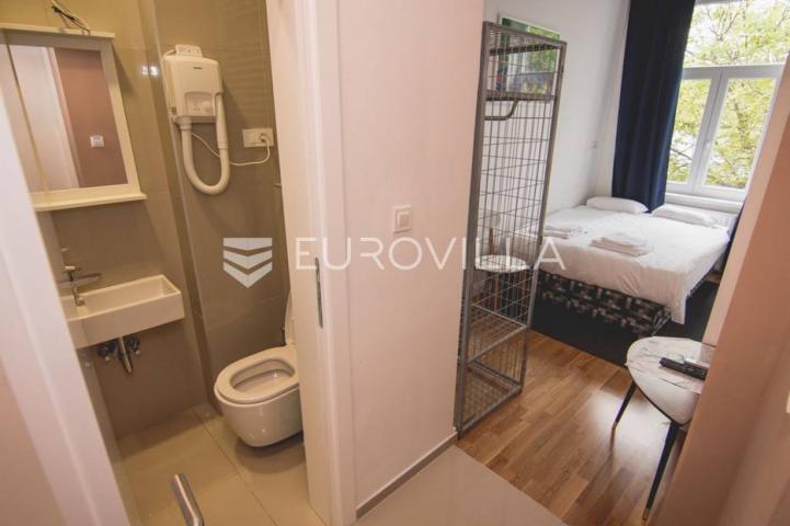 Centar stan 205m2 podijeljen na 5 apartmana i sobu