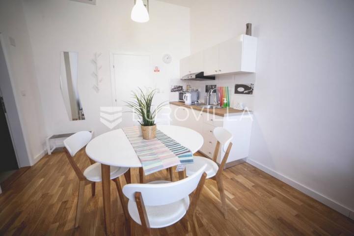 Centar stan 205m2 podijeljen na 5 apartmana i sobu