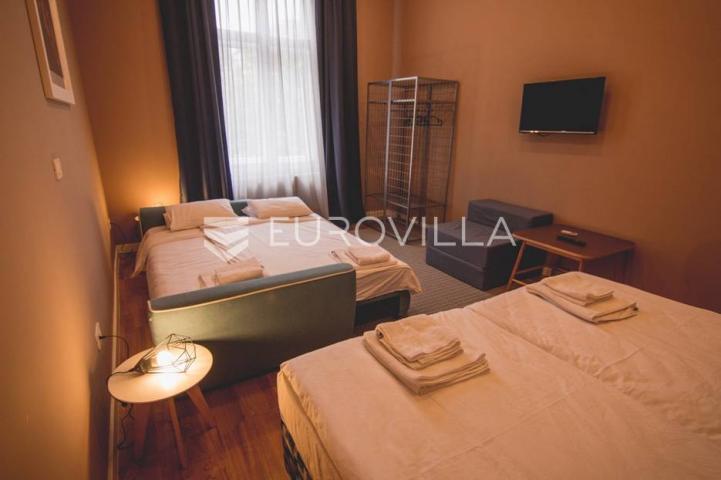 Centar stan 205m2 podijeljen na 5 apartmana i sobu