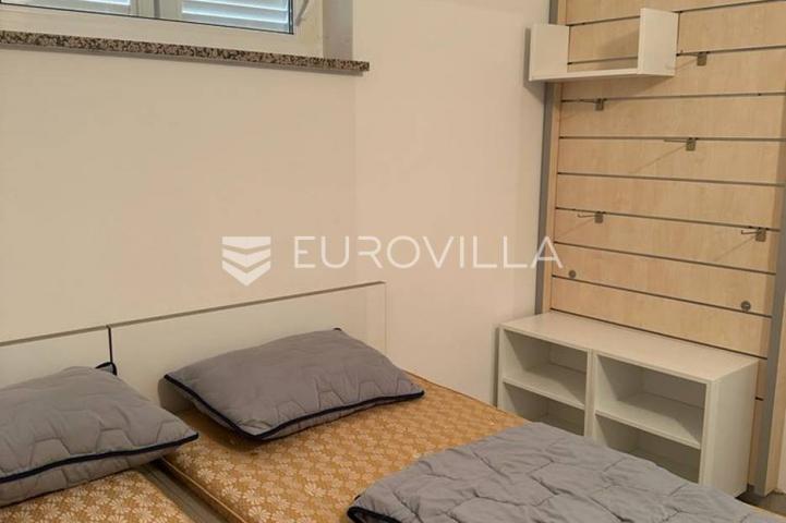 Istra, Barbariga, trosoban stan 50 m² u podrumskom dijelu stambene zgrade, pogled more