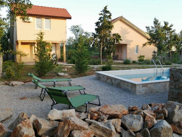 Three-house complex for Sale with a spacious landscaped plot and swimming pool in Zagora, Budva