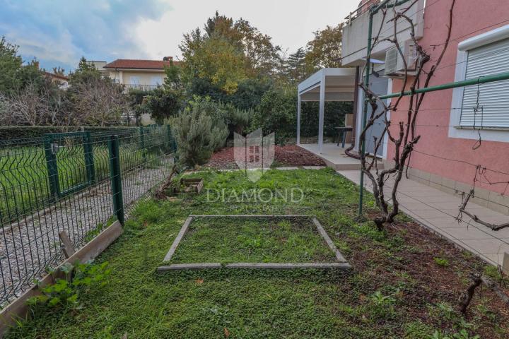 Atraktivan stan s privatnim vrtom u Premanturi
