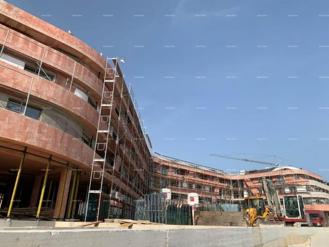 Stan Poreč, stambeno poslovni objekt u gradnji sa apartmanima i podzemnim garažama