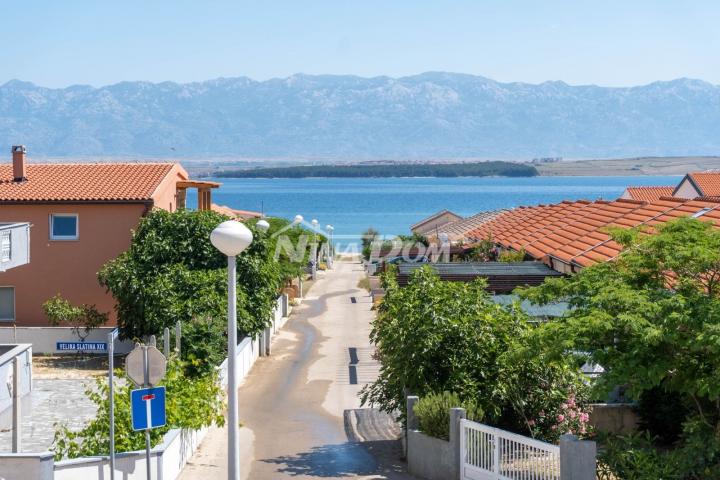 Apartmanska kuća s prostranom okućnicom. 