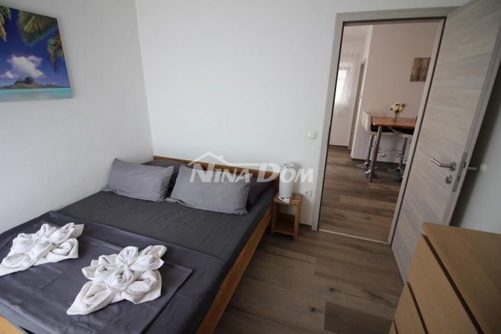 Apartmanska kuća s 4 stambene jedinice, 140 met. do plaže Prezida