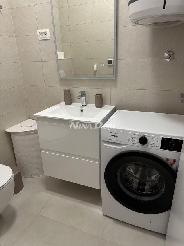 Ugljan luksuzan dvosoban apartman sa zajedničkim bazenom i ljetnom kuhinjom