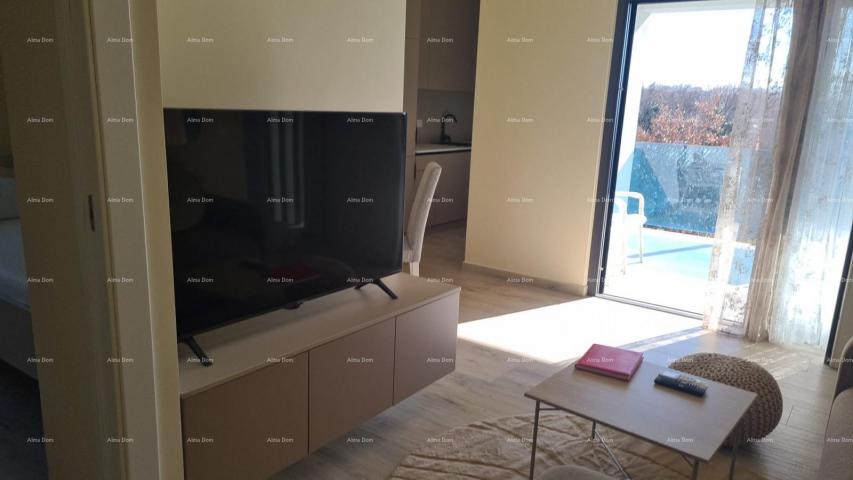 Stan Moderan apartman u bloku F, s dva parkirna mjesta i spremištem, u blizini Umaga!F2