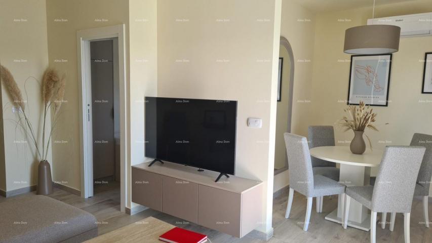 Stan Moderan apartman u bloku F, s dva parkirna mjesta i spremištem, u blizini Umaga!F2