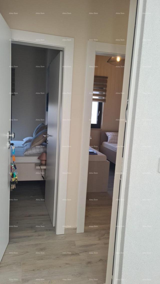 Stan Moderan apartman u bloku E, s parkirnim mjestom i spremištem blizina Umaga!