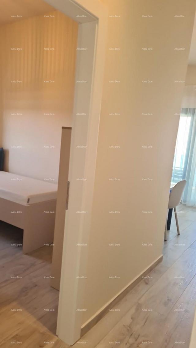 Stan Moderan apartman u bloku E, s parkirnim mjestom i spremištem blizina Umaga!
