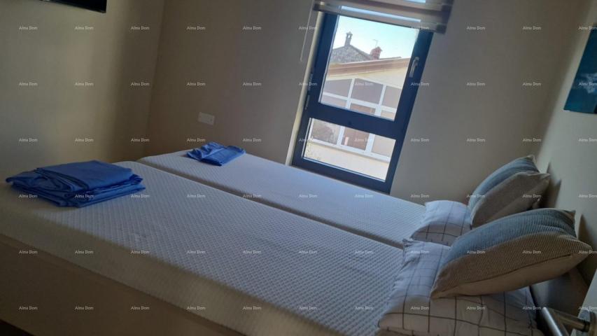 Stan Moderan apartman u bloku E, s parkirnim mjestom i spremištem blizina Umaga!