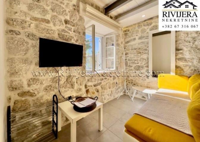 For sale two authentic stone properties on the first line by the sea Perast