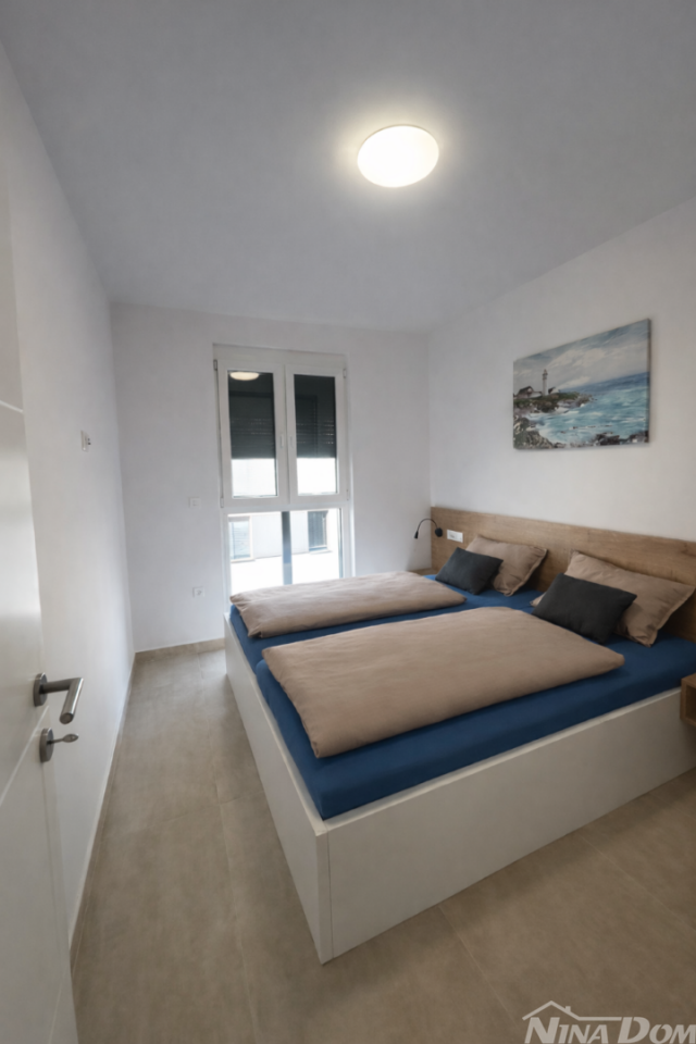 Luksuzni stan s krovnom terasom 50 m od mora i pogledom na Zadar i otoke arhipelag