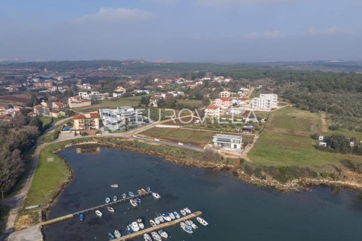 Istra, Pomer, građevinsko zemljište 511 m², 80 m od mora, pogled na more