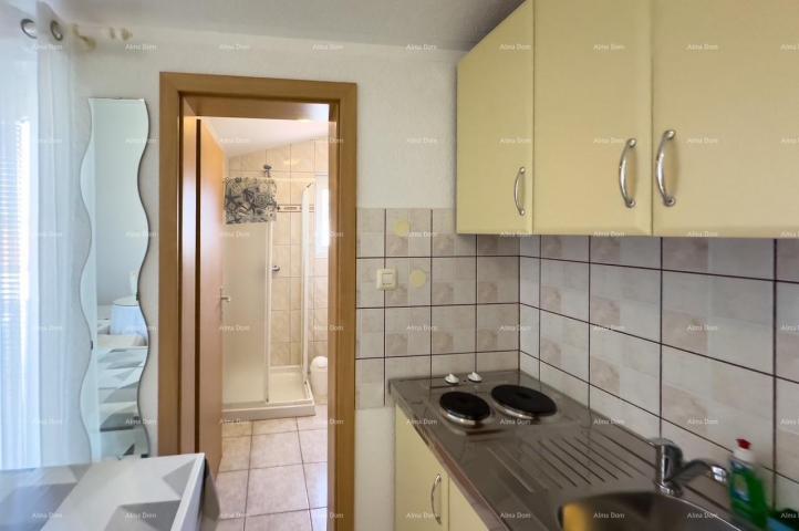 Apartment MEDULIN! Studio apartment on the second floor of a multi-story building.