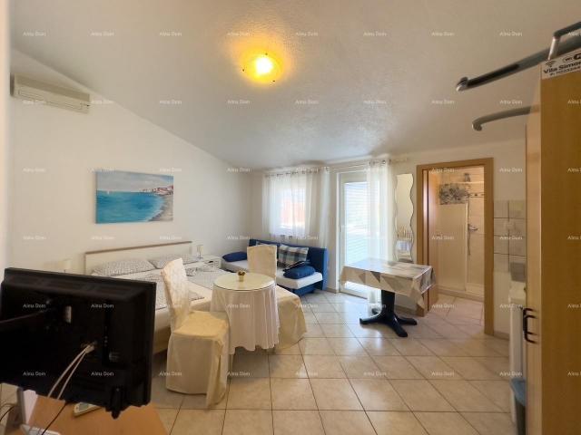 Apartment MEDULIN! Studio apartment on the second floor of a multi-story building.