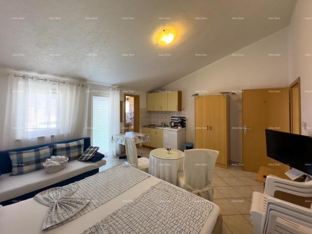 Apartment MEDULIN! Studio apartment on the second floor of a multi-story building.