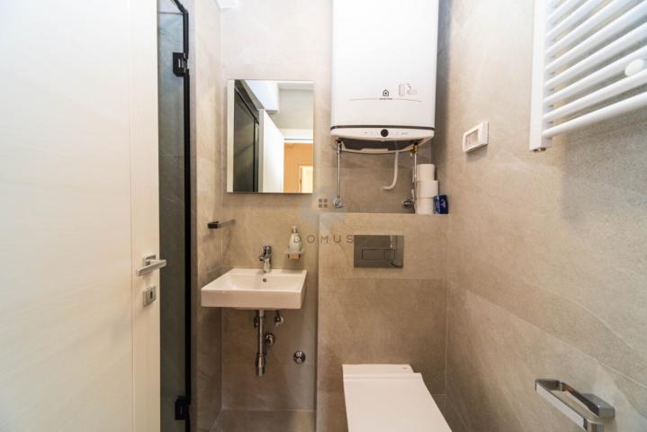 Dvosoban stan 67m2 + garaža, Central Point - Podgorica