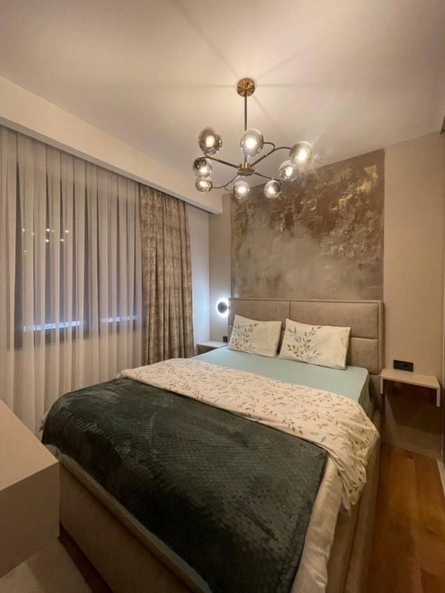 Stylish 3 bedroom apartment with sea view, complex with swimming pool in Becici