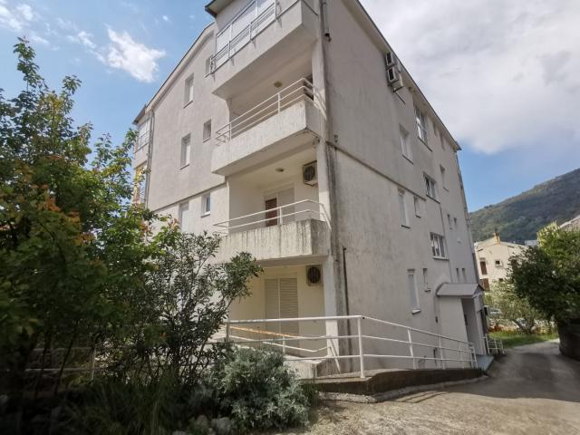 An apartment with a sea view in Petrovac is offered for sale. 