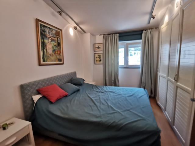 An apartment with a sea view in Petrovac is offered for sale. 