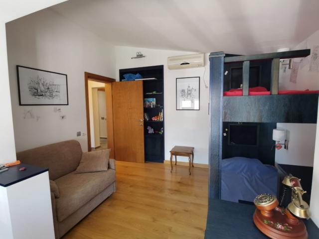 An apartment with a sea view in Petrovac is offered for sale. 