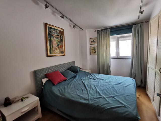 An apartment with a sea view in Petrovac is offered for sale. 