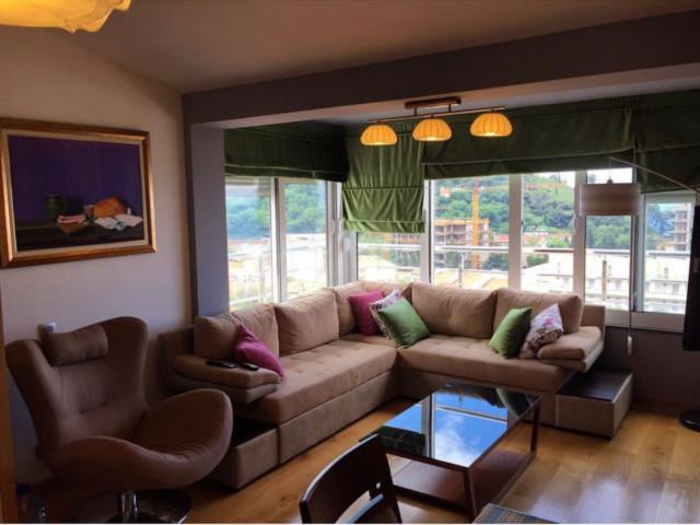 An apartment with a sea view in Petrovac is offered for sale. 