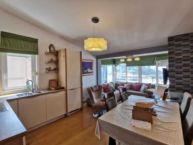 An apartment with a sea view in Petrovac is offered for sale. 