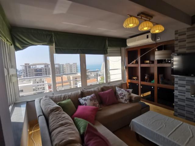 An apartment with a sea view in Petrovac is offered for sale. 