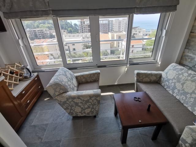 An apartment with a sea view in Petrovac is offered for sale. 