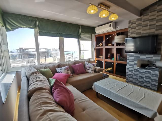 An apartment with a sea view in Petrovac is offered for sale. 