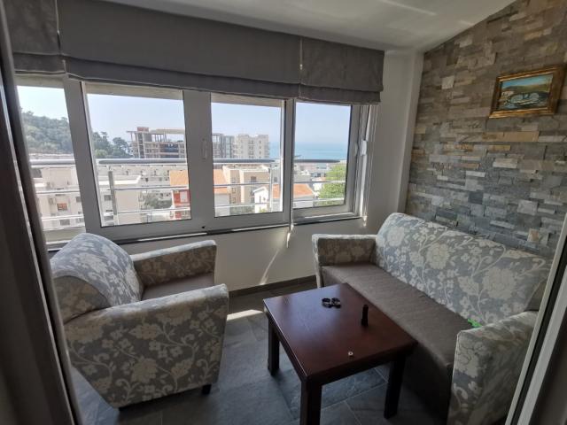 An apartment with a sea view in Petrovac is offered for sale. 