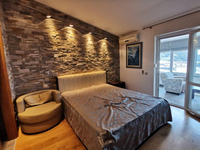 An apartment with a sea view in Petrovac is offered for sale. 