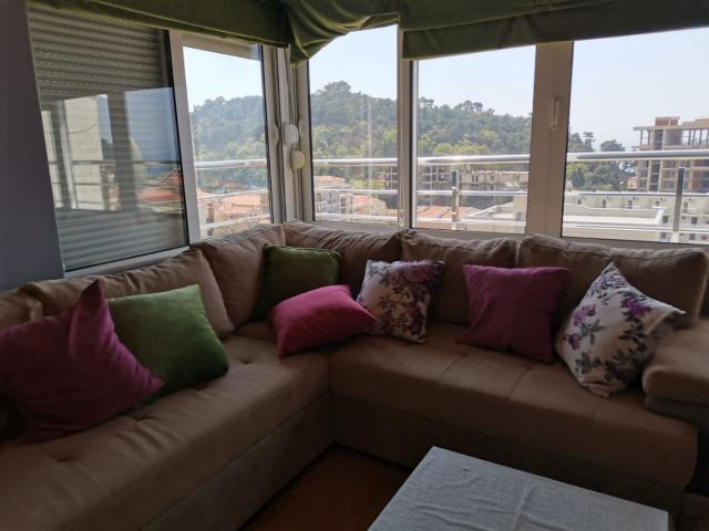An apartment with a sea view in Petrovac is offered for sale. 