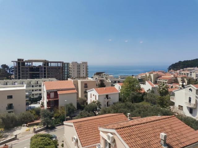 An apartment with a sea view in Petrovac is offered for sale. 
