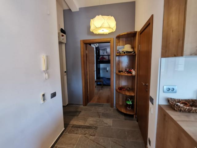 An apartment with a sea view in Petrovac is offered for sale. 