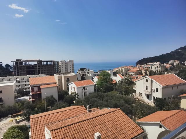 An apartment with a sea view in Petrovac is offered for sale. 