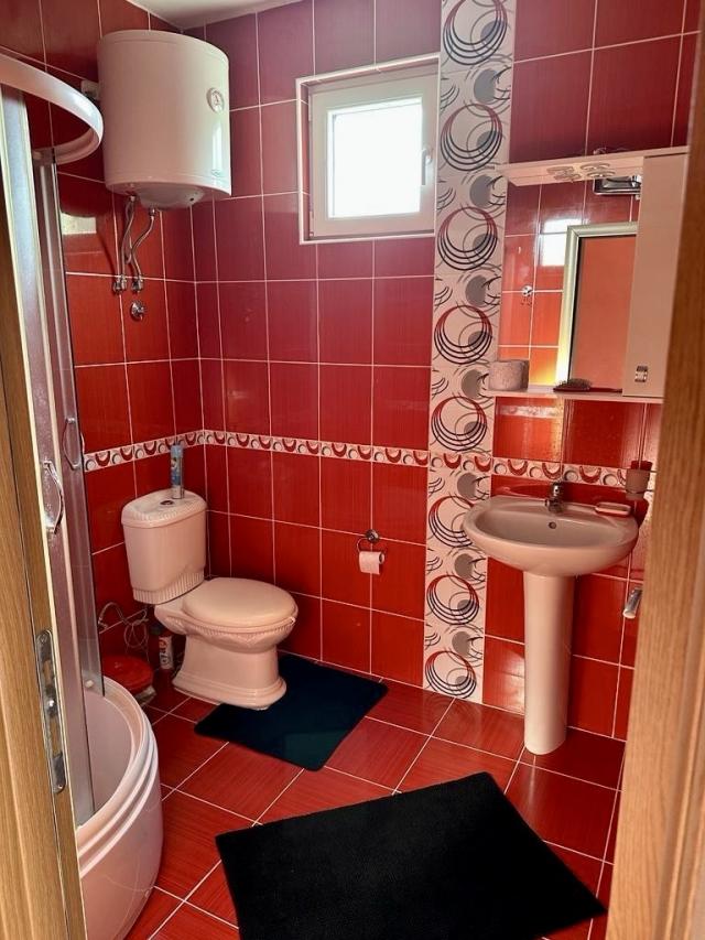 Three-storey house with two apartments in Utjeha, Montenegro - 120,000 euros