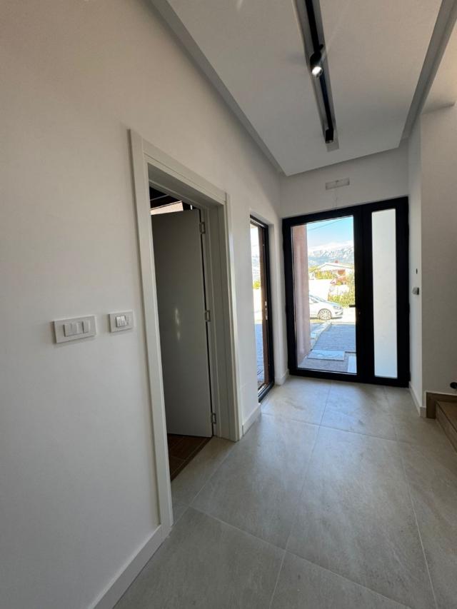 A modern villa at the final stage of construction in Bar, Polje district is offered for sale. 