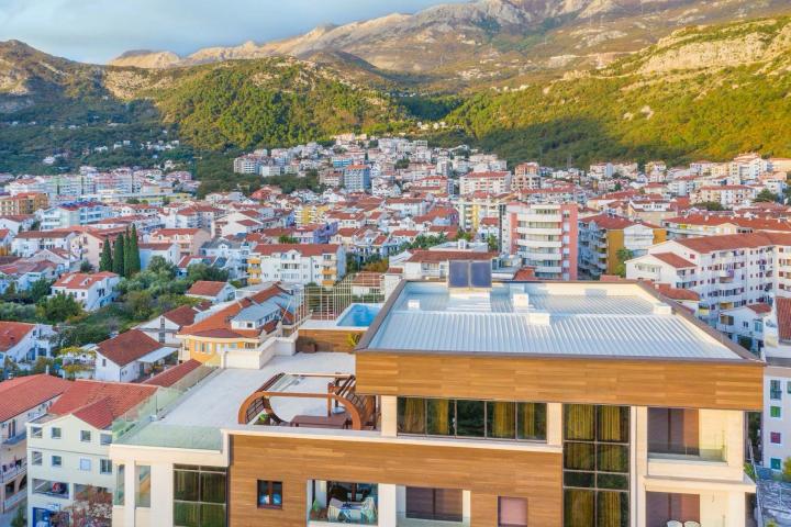 For sale exclusive penthouse with swimming pool and panoramic sea view in Budva!